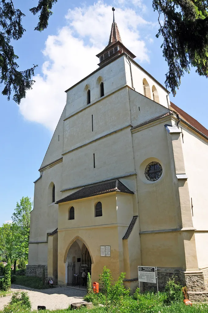 Built in Gothic style, Church on the Hill dominates the hill at the southern end of the citadel. The building of the church started in 1345 and ended in 1525, 180 years later. The church was recently restored, it had been completely painted on the inside, in 1776 it was decided to destroy the old painting provided that exact copies should be made on parchment. Unfortunately the copies were lost. The recent restoration brought back fragments of the late 15th century frescoes. They look so fragile, lost as they are in a sea of white paint. Also inside the church there are beautiful religious sculptures and paintings like the pulpit carved in 1480, an old stone holy water front dating from the 15th century as well as shrines brought from the churches of Saes and Cund.