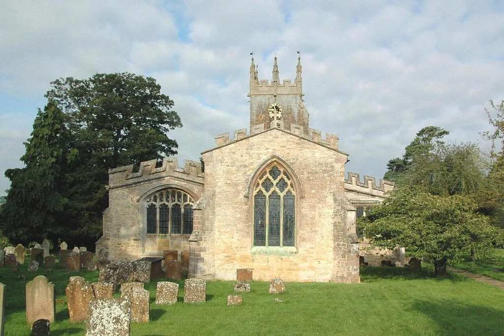 Church of England parish church of St James, Somerton, Oxfordshire: view from the east, showing east windows of the chancel and the Fermor chapel. The chapel east (left) window is Perpendicular Gothic; the chancel east window (centre) is 19th century Gothic Revival in Decorated Gothic style with ogee tracery.