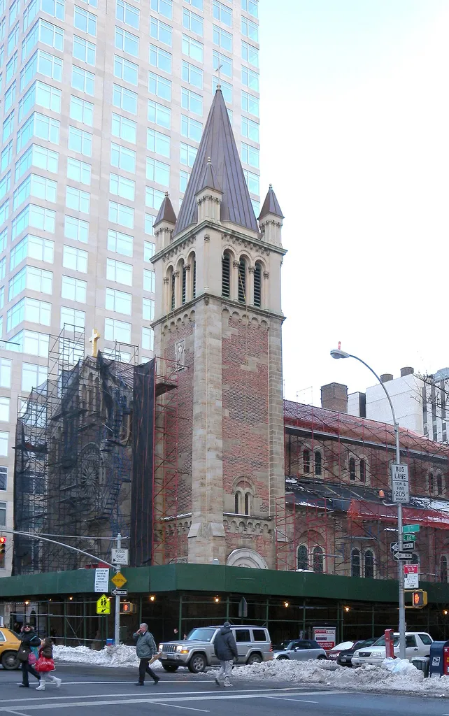 Looking northeast across 1st Avenue and 66th Street at Saint John Nepomucene Church on a cloudy afternoon. ZIP 10021.
