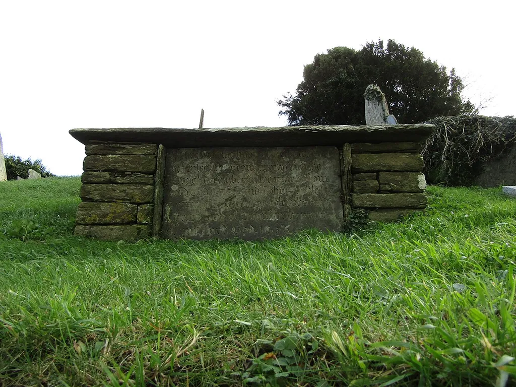 Chest tomb commemorating William Scoble in the churchyard of St. Andrew in East Allington, Devon, England.