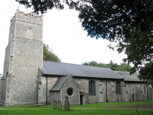 St Michael's church. St Michael's church > 1492602 is situated some distance away from any road, next-door to The Grange > 1380132 and adjoined by a woodland in the south. It can be reached via a public footpath which traverses a paddock > 1380127. It is believed that St Michael replaced an earlier Norman church. The building as we see it today dates mainly from the 14th century and was restored in the early 19th century when the chancel was rebuilt. St Michael's shares with All Saints church in Chedgrave > 1361754 and St Ethelbert's church in Thurton > 1313165 a collection of 17th century Continental stained glass > 1492653 - 1492665 - 1492655. Much of it came from Rouen in France - which was imported for the Beauchamp Proctor family of Langley Park by JC Hampp of Norwich. The church houses a number of memorials > 1492640 to the Beauchamp Proctor family. The building is presently undergoing restoration work and is kept locked.