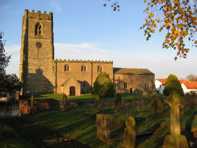 St Andrew's Church, Foston on the Wolds, East Riding of Yorkshire, England.The village is in the top NW corner of the grid square. This view from the cemetery across the road from the church looking north.