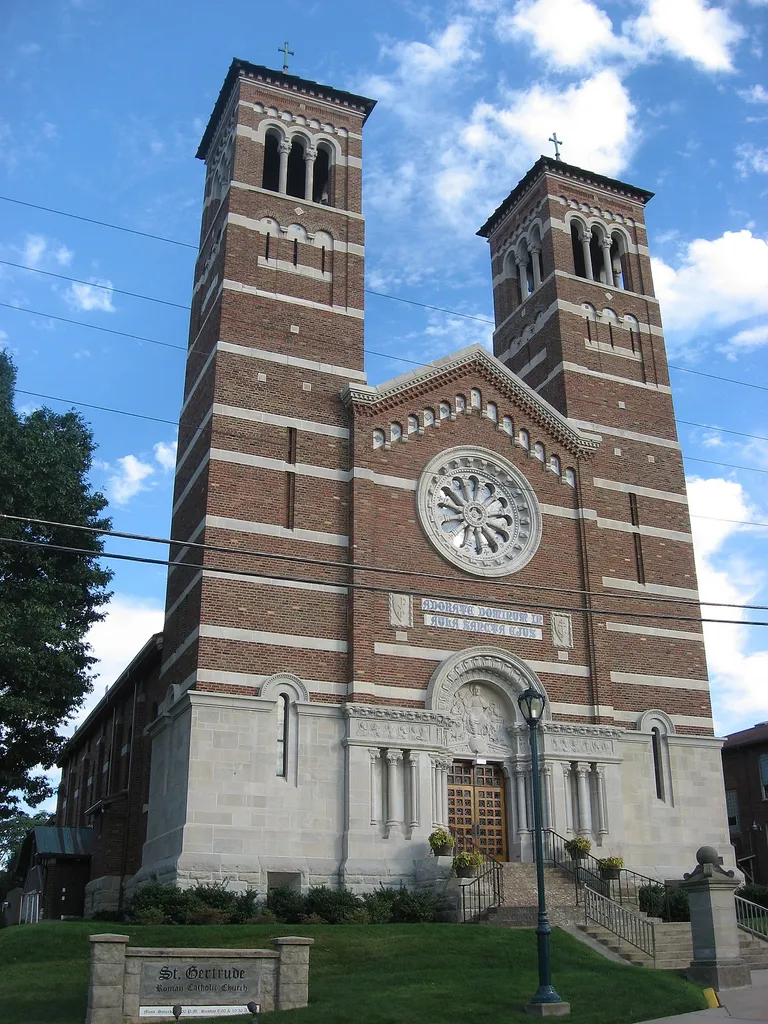 Front and northern side of St. Gertrude Roman Catholic Church, located at 311 Franklin Avenue in Vandergrift, Pennsylvania, United States. Built in 1911, it is listed on the National Register of Historic Places.
