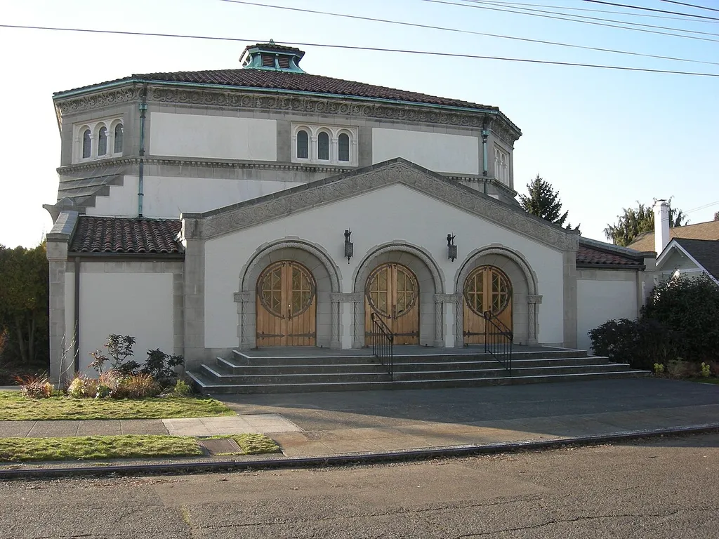 The 7th Church of Christ Scientist, corner of W Halladay Street and 8th Ave W, on Queen Anne Hill, Seattle, Washington was sold in 2007, and will be used by the Church of Christ. Built 1926; architect: Harlan Thomas. Page on church from Queen Anne Historical Society Page on church from Seattle Department of Neighborhoods