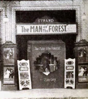 The Strand Theater in Atlanta, Georgia, showing the American western film Man of the Forest (1921), on page 50 of the August 20, 1921 Exhibitors Herald. The display uses the Zane Gray book to promote the film.