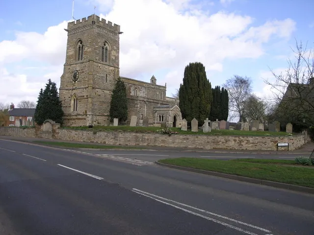 St Peter's parish church, Kettering Road, Isham, Northamptonshire, seen from south-southwest