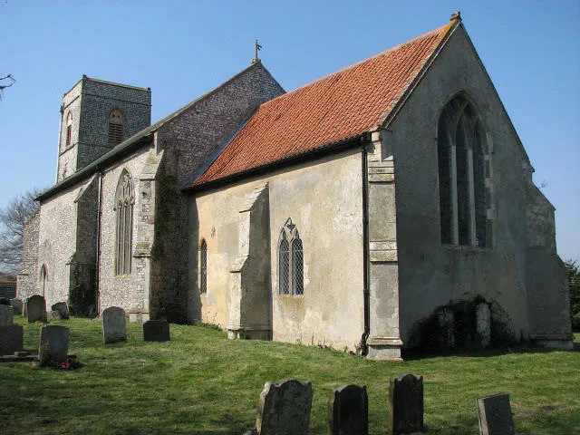 The church of Our Lady and St Margaret. The church of Our Lady and St Margaret > 866772 - 866789 was extensively restored and refaced with knapped flint during the 19th century, the east window dates from 1822. The communion rail > 866778 is from the 17th century and the pulpit is Jacobean > 866782 but some of the benches have old poppyheads, and the octagonal font > 866790 - with four carved lions at the angles of its stem - is C15; the font cover > 866791 is traditional in style but modern. A number of consecration crosses have survived on the walls > 866784. The church is kept locked but a key is available. For more information see: http://www.norfolkchurches.co.uk/calthorpe/calthorpe.htm