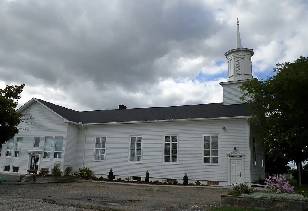 The First Baptist Church, located at 6106 S Saginaw Rd, Grand Blanc, MI.
