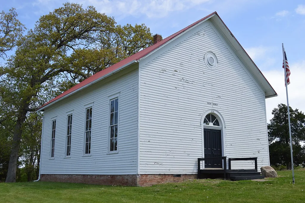 Western side and front of the Union Church, located on Kirby Road southeast of Oreana in Long Creek Township, Macon County, Illinois, United States. Built in 1876, it is listed on the National Register of Historic Places.