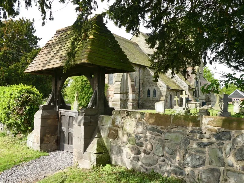 Photograph of the lychgate, St Lucia's Church, Upton Magna, Shropshire, England. .mw-parser-output .messagebox{margin:4px 0;width:auto;border-collapse:collapse;border:2px solid var(--border-color-progressive,#6485d1);background-color:var(--background-color-neutral-subtle,#fbfcff);color:var(--color-base,#202122);box-sizing:border-box;border-inline-start-width:8px}.mw-parser-output .messagebox.mbox-small{font-size:88%;line-height:1.25em}.mw-parser-output .mbox-warning,.mw-parser-output .mbox-speedy{border:2px solid var(--border-color-error,#b22222);background:var(--background-color-error-subtle,#ffdbdb);border-inline-start-width:8px}.mw-parser-output .mbox-serious,.mw-parser-output .mbox-delete,.mw-parser-output .mbox-stop{border:2px solid var(--border-color-error,#b22222);border-inline-start-width:8px}.mw-parser-output .mbox-issue,.mw-parser-output .mbox-content{border:2px solid #f28500;background:var(--background-color-warning-subtle,#ffe);border-inline-start-width:8px}.mw-parser-output .mbox-query,.mw-parser-output .mbox-style{border:2px solid #f4c430;background:var(--background-color-warning-subtle,#ffe);border-inline-start-width:8px}.mw-parser-output .mbox-shit{border:2px solid #960;border-inline-start-width:8px}.mw-parser-output .mbox-license{border:2px solid #88a;border-inline-start-width:initial}.mw-parser-output .mbox-legal{border:2px solid var(--border-color-notice,#666);background:var(--background-color-base,#fff);border-inline-start-width:8px}.mw-parser-output .mbox-honor{border:2px solid #ca3;background:var(--background-color-warning-subtle,#fcf4db);border-inline-start-width:8px}.mw-parser-output .mbox-growth{border:2px solid #8d4;background:var(--background-color-success-subtle,#d5fdf4);border-inline-start-width:8px}.mw-parser-output .mbox-move{border:2px solid #93c;border-inline-start-width:8px}.mw-parser-output .mbox-protection,.mw-parser-output .mbox-message{border:2px solid var(--border-color-base,#aaa);border-inline-start-width:8px}.mw-parser-output