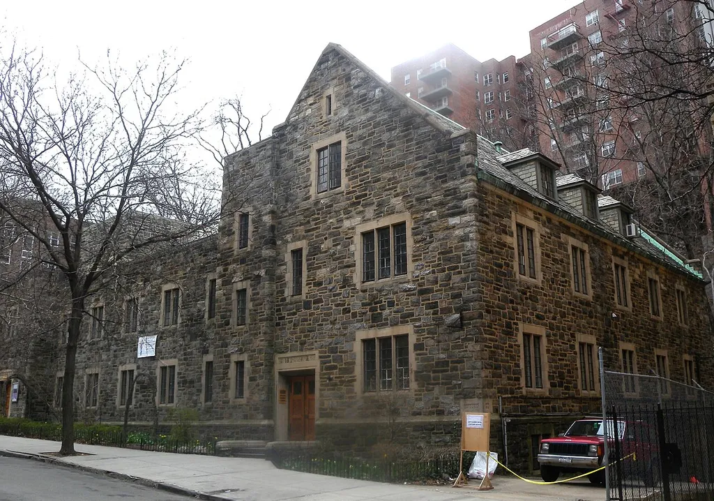 Looking west across Bennet Avenue and up the hill at Church of Our Savior's Atonement on a cloudy midday.