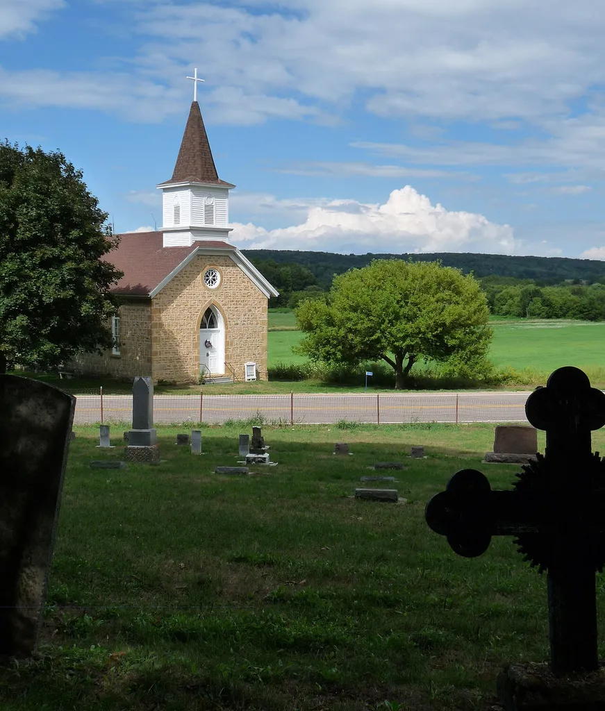 Our Lady of Loretto is a Roman Catholic church built in 1880 in Gothic Revival style, in rural Sauk County, Wisconsin. Today the building is a museum and the church and cemetery are listed on the National Register of Historic Places.