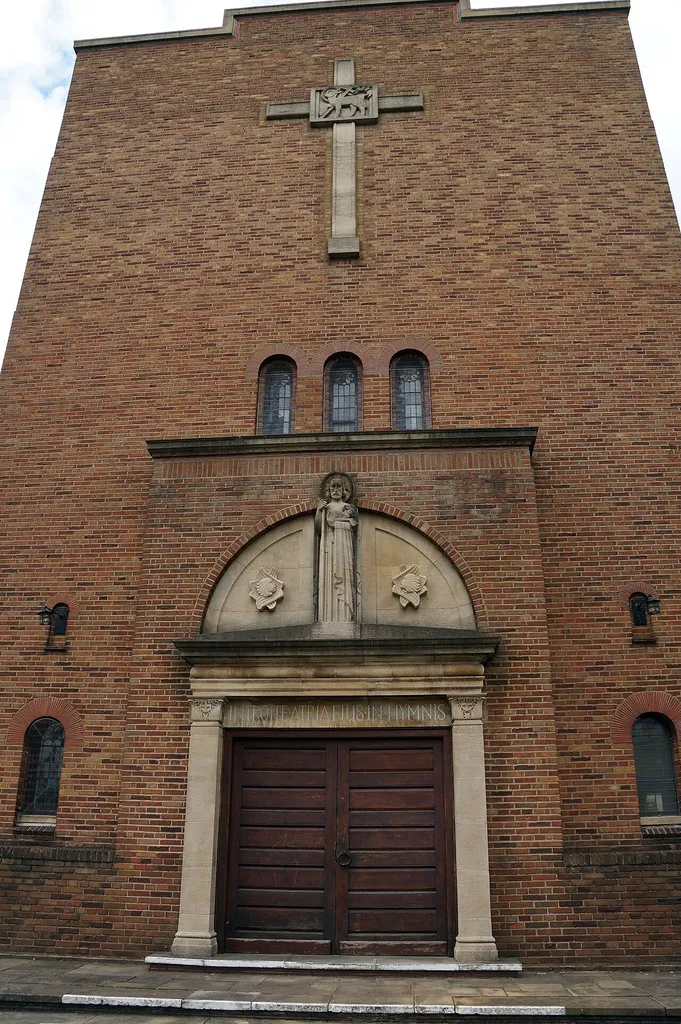 South-facing wall (what is architecturally the west wall as the church faces north at the chancel end) of Christ Church, Burney Lane, Ward End, Birmingham, England by architect Holland W. Hobbiss and local sculptor William Bloye, c1935. Contrast modified in Photoshop.