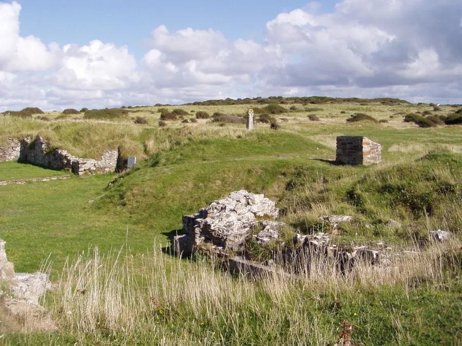 St Piran's Church remains, St Piran's Cross, and their surrounding enclosure .mw-parser-output .messagebox{margin:4px 0;width:auto;border-collapse:collapse;border:2px solid var(--border-color-progressive,#6485d1);background-color:var(--background-color-neutral-subtle,#fbfcff);color:var(--color-base,#202122);box-sizing:border-box;border-inline-start-width:8px}.mw-parser-output .messagebox.mbox-small{font-size:88%;line-height:1.25em}.mw-parser-output .mbox-warning,.mw-parser-output .mbox-speedy{border:2px solid var(--border-color-error,#b22222);background:var(--background-color-error-subtle,#ffdbdb);border-inline-start-width:8px}.mw-parser-output .mbox-serious,.mw-parser-output .mbox-delete,.mw-parser-output .mbox-stop{border:2px solid var(--border-color-error,#b22222);border-inline-start-width:8px}.mw-parser-output .mbox-issue,.mw-parser-output .mbox-content{border:2px solid #f28500;background:var(--background-color-warning-subtle,#ffe);border-inline-start-width:8px}.mw-parser-output .mbox-query,.mw-parser-output .mbox-style{border:2px solid #f4c430;background:var(--background-color-warning-subtle,#ffe);border-inline-start-width:8px}.mw-parser-output .mbox-shit{border:2px solid #960;border-inline-start-width:8px}.mw-parser-output .mbox-license{border:2px solid #88a;border-inline-start-width:initial}.mw-parser-output .mbox-legal{border:2px solid var(--border-color-notice,#666);background:var(--background-color-base,#fff);border-inline-start-width:8px}.mw-parser-output .mbox-honor{border:2px solid #ca3;background:var(--background-color-warning-subtle,#fcf4db);border-inline-start-width:8px}.mw-parser-output .mbox-growth{border:2px solid #8d4;background:var(--background-color-success-subtle,#d5fdf4);border-inline-start-width:8px}.mw-parser-output .mbox-move{border:2px solid #93c;border-inline-start-width:8px}.mw-parser-output .mbox-protection,.mw-parser-output .mbox-message{border:2px solid var(--border-color-base,#aaa);border-inline-start-width:8px}.mw-parser-output .me