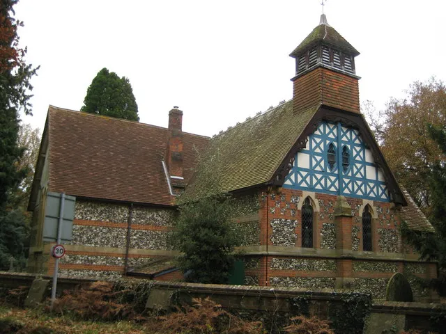 Littleworth Common: St Anne's Church This is the other side of the church photographed by David in 34471. This end has a belfry with unusual blue-painted half-timbering with a pair of elliptical windows, rather than the flint and brick that the rest of the church is built of.