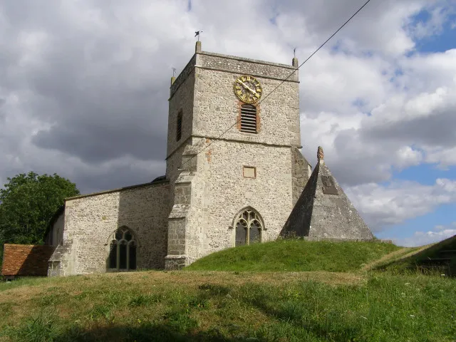 St Andrew's Church, Nether Wallop. At the beginning of the 18th century the church tower (and steeple) collapsed and was rebuilt. The tower has recently been renovated, as is probably obvious from this photo. The pyramid on a mound in front of the tower marks the grave of Francis Douce who died in 1760 - more information here: 213585.