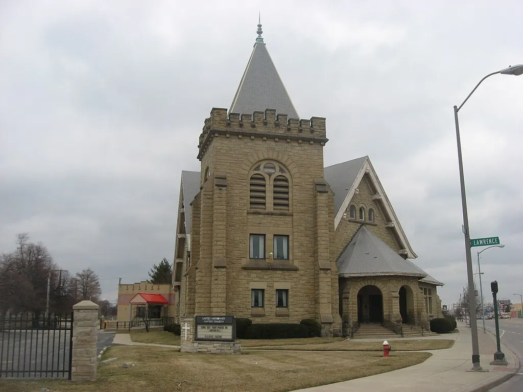 Front and southern side of the former First Church of Christ, Scientist (now the United Missionary Baptist Church), located at 2704 Monroe Street (State Route 51) in Toledo, Ohio, United States. Built in 1898, it is listed on the National Register of Historic Places, and it is part of a Register-listed historic district, the Englewood Historic District.