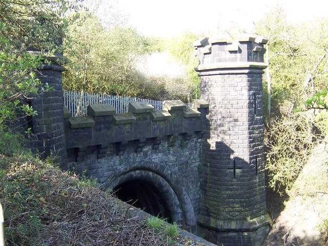 Clay Cross Tunnel, near to Clay Cross, Derbyshire, Great Britain. This is Clay Cross Tunnel which is of Moorish design and grade 2 listed. The tunnel was completed in 1839 by George Stephenson and is 1,784 yards long and Clay Cross High Street is 150 feet above the line. The tunnel eventually cost �140,000 instead of �98,000 with the lost of 15 lives. As the tunnel was bored out they found coal and iron in large amounts and so George Stephenson opened Clay Cross Company.