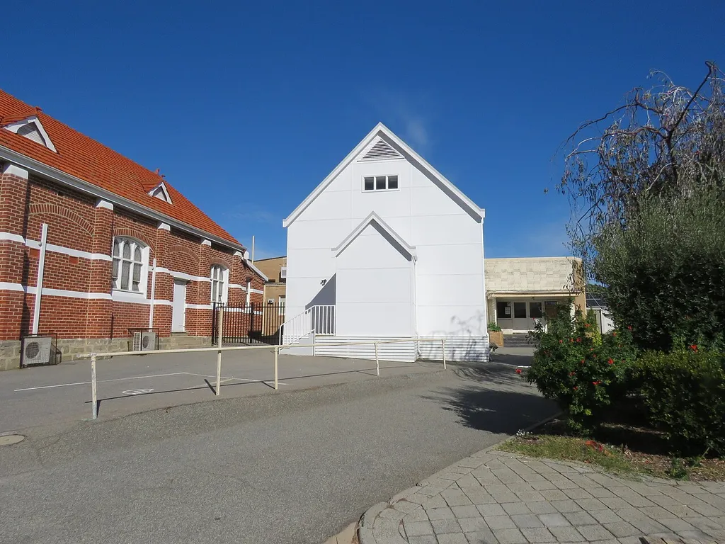 The heritage listed (Inherit # 25077) Old Wesleyan Church, Mosman Park, Western Australia. The building to the left is the Mosman Park Uniting Church.