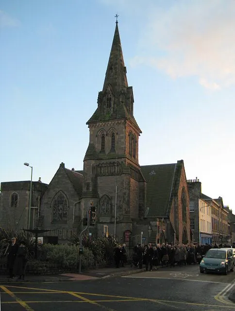 St John's Episcopal Church The late afternoon sun is lighting up the west-facing walls of the church as a large crowd spills out into Princes Street following a memorial service. https://www.episcopal-perth.org.uk