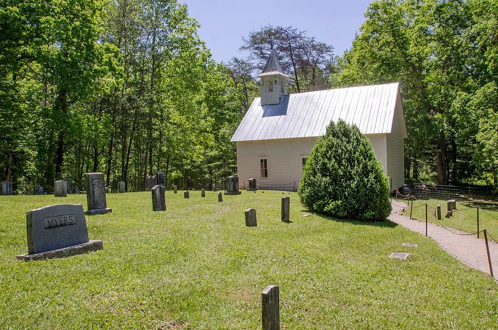 The Primitive Baptist Church, as constructed in 1887. The church was originally called the Cades Cove Baptist Church and established in 1827 although a physical church was not constructed until 1832. Members initially met in their homes. This is the oldest of three churches at Cades Cove. In the 1840s the congregation experienced a major split due to different religious interpretations regarding temperance societies, Sunday School, and missionary work.The church was renamed the Primitive Baptist Church when This church was actively in use up to the 1960s.