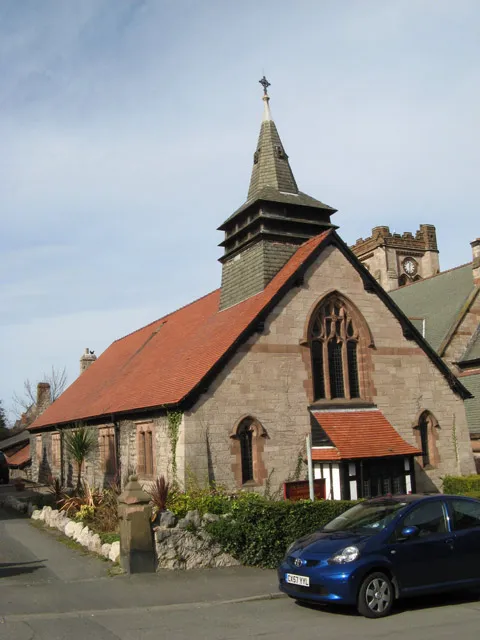 Eglwys Dewi Sant Standing in the shadow of St.Paul's parish church is this smaller edifice which was built in 1902, some years after the larger church, for use by the Welsh-speaking congregation. Although it is roofed in tile rather than green slate, this building has many similarities with the larger building, in that it is built in limestone with red sandstone windows.