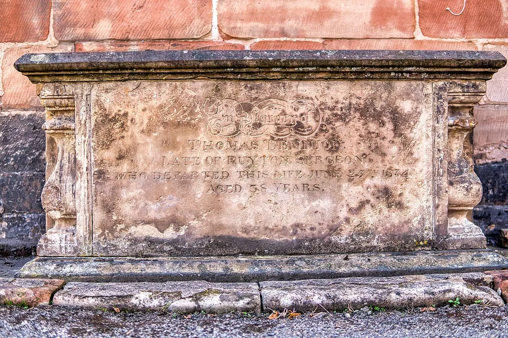 Bennion/Lewis Memorial Abutting East End Of Vestry Of Church Of St Oswald .mw-parser-output .messagebox{margin:4px 0;width:auto;border-collapse:collapse;border:2px solid var(--border-color-progressive,#6485d1);background-color:var(--background-color-neutral-subtle,#fbfcff);color:var(--color-base,#202122);box-sizing:border-box;border-inline-start-width:8px}.mw-parser-output .messagebox.mbox-small{font-size:88%;line-height:1.25em}.mw-parser-output .mbox-warning,.mw-parser-output .mbox-speedy{border:2px solid var(--border-color-error,#b22222);background:var(--background-color-error-subtle,#ffdbdb);border-inline-start-width:8px}.mw-parser-output .mbox-serious,.mw-parser-output .mbox-delete,.mw-parser-output .mbox-stop{border:2px solid var(--border-color-error,#b22222);border-inline-start-width:8px}.mw-parser-output .mbox-issue,.mw-parser-output .mbox-content{border:2px solid #f28500;background:var(--background-color-warning-subtle,#ffe);border-inline-start-width:8px}.mw-parser-output .mbox-query,.mw-parser-output .mbox-style{border:2px solid #f4c430;background:var(--background-color-warning-subtle,#ffe);border-inline-start-width:8px}.mw-parser-output .mbox-shit{border:2px solid #960;border-inline-start-width:8px}.mw-parser-output .mbox-license{border:2px solid #88a;border-inline-start-width:initial}.mw-parser-output .mbox-legal{border:2px solid var(--border-color-notice,#666);background:var(--background-color-base,#fff);border-inline-start-width:8px}.mw-parser-output .mbox-honor{border:2px solid #ca3;background:var(--background-color-warning-subtle,#fcf4db);border-inline-start-width:8px}.mw-parser-output .mbox-growth{border:2px solid #8d4;background:var(--background-color-success-subtle,#d5fdf4);border-inline-start-width:8px}.mw-parser-output .mbox-move{border:2px solid #93c;border-inline-start-width:8px}.mw-parser-output .mbox-protection,.mw-parser-output .mbox-message{border:2px solid var(--border-color-base,#aaa);border-inline-start-width:8px}.mw-parser-output .messa