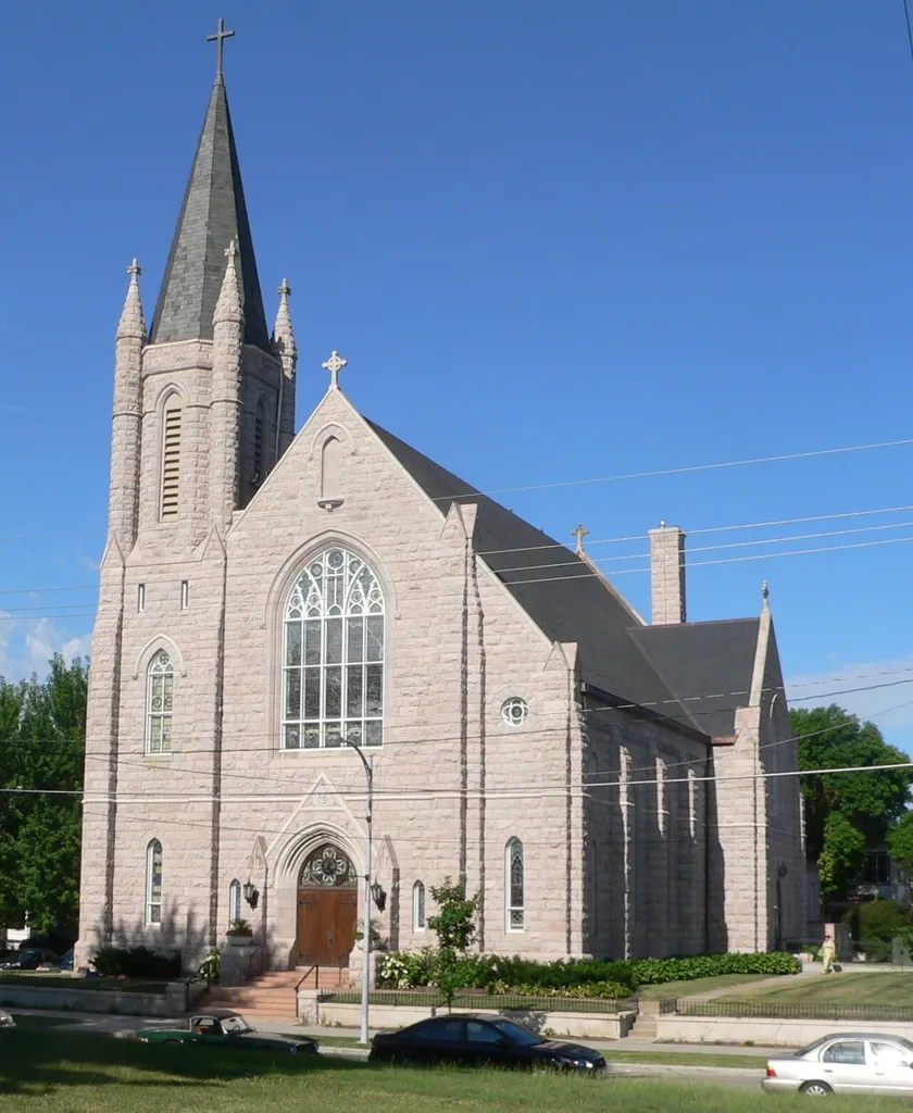 Sacred Heart Church, located at northwest corner of 22nd and Binney Streets in Omaha, Nebraska; seen from the northeast, across 22nd.
