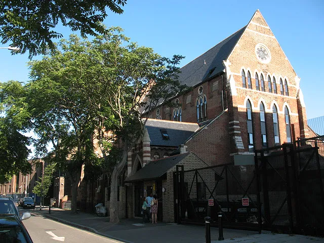 St Augustine's Court, Lynton Road, Bermondsey. It would be hard to disguise the fact that this 'court' was originally a church. In fact, St Augustine's was one of the largest churches in South London, built in 1875-1883 to the designs of Henry Jarvis, and seated 950 people. That was one reason for its proposed closure when the parish merged with that of St Anne 1449457 in 1970 but in fact it was not formally declared redundant by the Church of England until 1995. After a short period of lease to another Christian group it was sold in 2005 for conversion to residential use. The building remains listed grade 2*.
