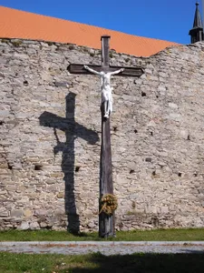 cross outside the walls of Church of Saint John the Baptist (Velká Bíteš)