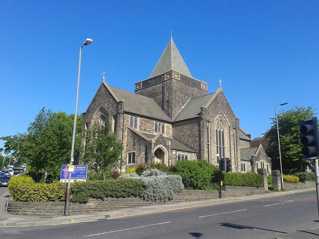 St Aidan's parish church, at the junction of Manor Lane (left) and City Road, Sheffield, South Yorkshire, seen from the west
