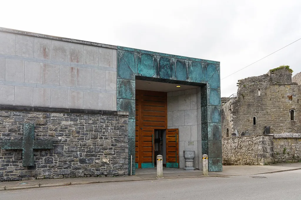 Entrance to St. Mary of the Rosary with the ruins of Cong Abbey in the background.