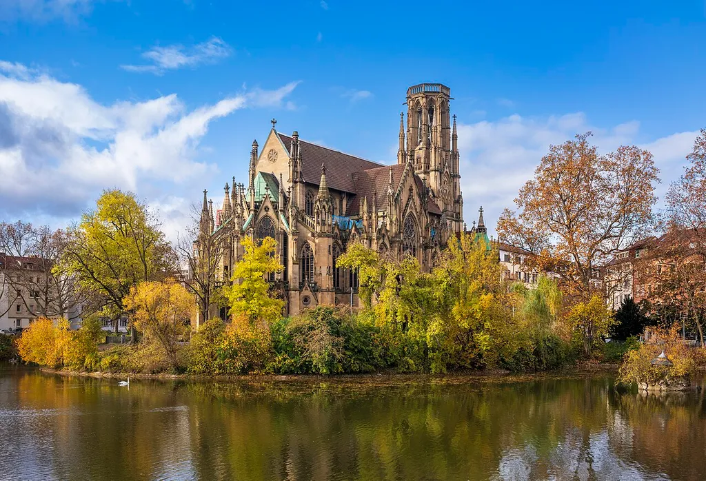 Stuttgart, Germany: The Johanneskirche (Saint John’s church) was built in 1864 to 1876 in Gothic Revival style on a peninsula in the Feuersee. View from east-south-east in autumn.
