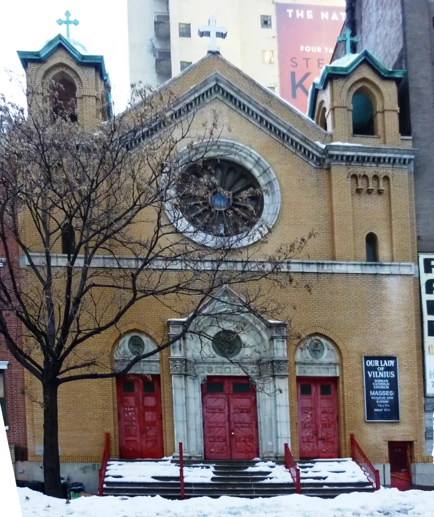 Our Lady of Vilnius Church is a closed Roman Catholic parish church that has been threatened with demolition and been the subject of a landmarks preservation debate. The church is located at 568-570 Broome Street in the Hudson Square neighborhood of Manhattan, New York City, east of the entrance to the Holland Tunnel, but predating it. The yellow brick Romanesque Revival-style church was built for $25,000 in 1910 and was designed by theatre architect Harry G. Wiseman.