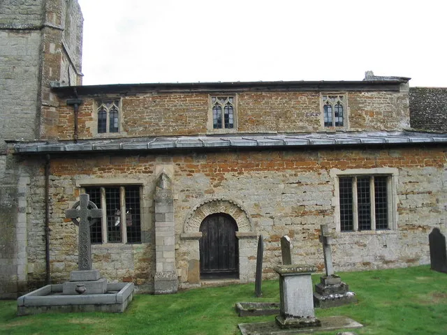 St Peter's parish church, Horninghold, Leicestershire. South side of nave, showing the Norman doorway re-set in the south aisle.