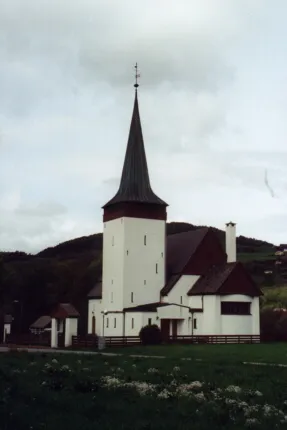 Todays church in Vikebygd, Norway. Own picture. Picture taken from the road, from the North side. This is a photo of a monument in Norway, number: 85839 in the Norwegian Directorate for Cultural Heritage database.