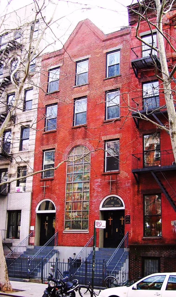 The Church of St. Cyril at 62 St. Mark's Place between First and Second Avenues in the East Village neighborhood of Manhattan, New York City, was built in 1920 for the Roman Catholic Slovenian parish Slovenska Cerkev Sv. Cirila which was founded in 1916. (Sources: From Abyssinian to Zion (2004) and NYC GIS map)