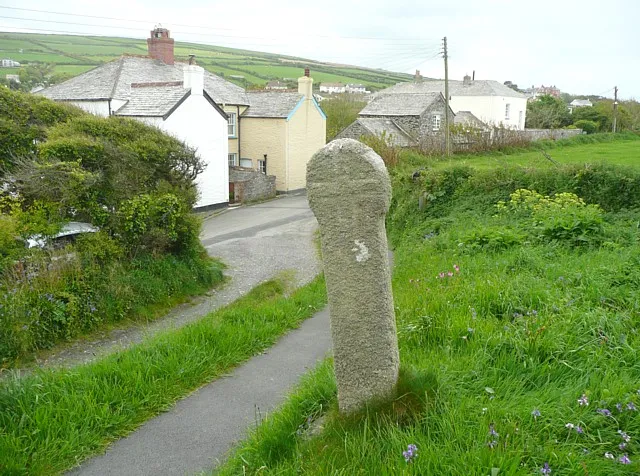 Cross at Forrabury Church, near Boscastle A simple wheel-head cross of granite alongside the driveway leading to the church.