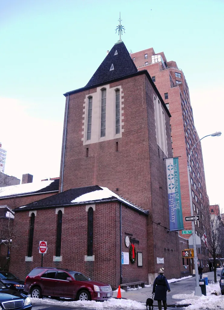 Looking north across 74th at Epiphany Church on a mostly cloudy afternoon.