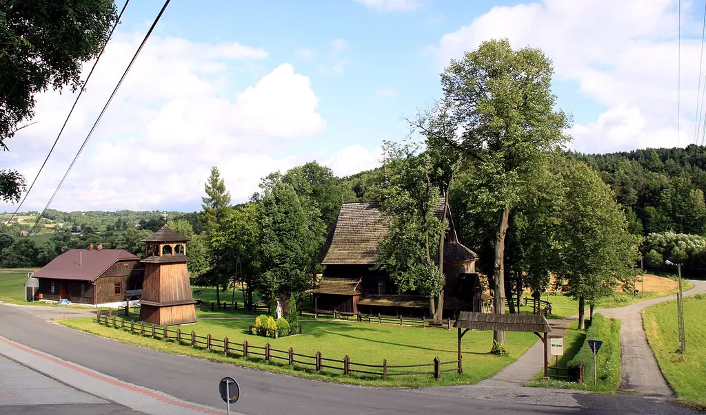 Church, bell tower and old organist's house in Gosprzydowa.