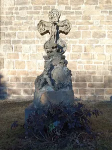 stone cross at the old cemetery of Church of St. Bartholomew in Kyje