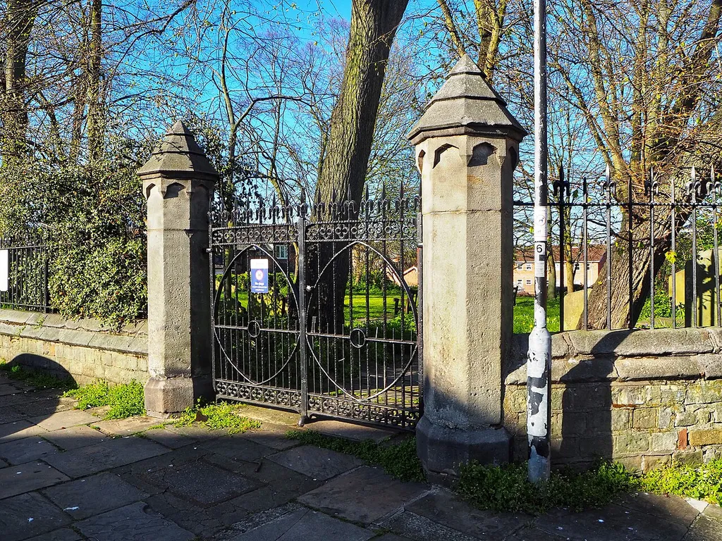 Gates, walls and railings to former churchyard of St Mary Bishophill Senior, York. c1860. Grade II listed. .mw-parser-output .messagebox{margin:4px 0;width:auto;border-collapse:collapse;border:2px solid var(--border-color-progressive,#6485d1);background-color:var(--background-color-neutral-subtle,#fbfcff);color:var(--color-base,#202122);box-sizing:border-box;border-inline-start-width:8px}.mw-parser-output .messagebox.mbox-small{font-size:88%;line-height:1.25em}.mw-parser-output .mbox-warning,.mw-parser-output .mbox-speedy{border:2px solid var(--border-color-error,#b22222);background:var(--background-color-error-subtle,#ffdbdb);border-inline-start-width:8px}.mw-parser-output .mbox-serious,.mw-parser-output .mbox-delete,.mw-parser-output .mbox-stop{border:2px solid var(--border-color-error,#b22222);border-inline-start-width:8px}.mw-parser-output .mbox-issue,.mw-parser-output .mbox-content{border:2px solid #f28500;background:var(--background-color-warning-subtle,#ffe);border-inline-start-width:8px}.mw-parser-output .mbox-query,.mw-parser-output .mbox-style{border:2px solid #f4c430;background:var(--background-color-warning-subtle,#ffe);border-inline-start-width:8px}.mw-parser-output .mbox-shit{border:2px solid #960;border-inline-start-width:8px}.mw-parser-output .mbox-license{border:2px solid #88a;border-inline-start-width:initial}.mw-parser-output .mbox-legal{border:2px solid var(--border-color-notice,#666);background:var(--background-color-base,#fff);border-inline-start-width:8px}.mw-parser-output .mbox-honor{border:2px solid #ca3;background:var(--background-color-warning-subtle,#fcf4db);border-inline-start-width:8px}.mw-parser-output .mbox-growth{border:2px solid #8d4;background:var(--background-color-success-subtle,#d5fdf4);border-inline-start-width:8px}.mw-parser-output .mbox-move{border:2px solid #93c;border-inline-start-width:8px}.mw-parser-output .mbox-protection,.mw-parser-output .mbox-message{border:2px solid var(--border-color-base,#aaa);border-inline-start-w