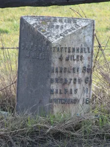 Milepost, just N of railway bridge, nr Smithy Farm, S of road to Waverton