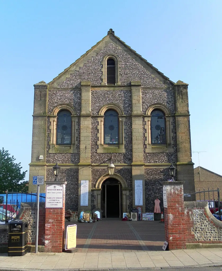 Former Trinity Congregational Chapel, Tarrant Street, Arundel, Arun District, West Sussex, England. Now an antiques market under the name Nineveh House. Listed at Grade II by English Heritage (NHLE Code 1277924)