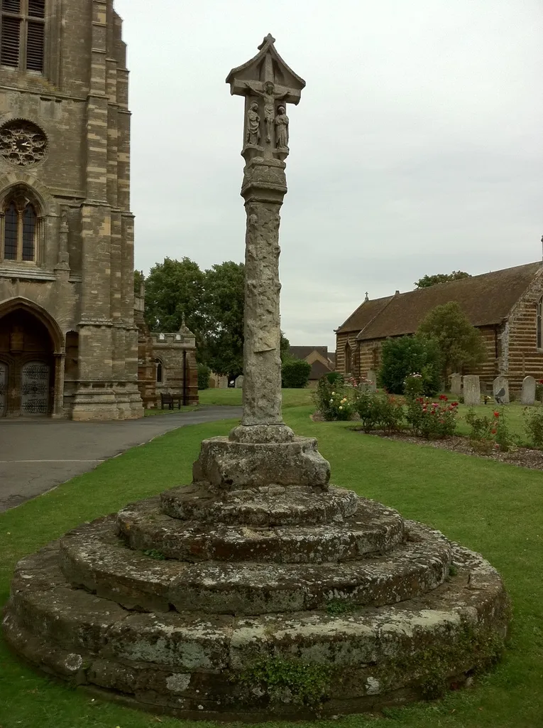 Stone cross in the parish churchyard of St Mary the Virgin, Higham Ferrers, Northamptonshire