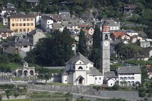 San Fedele Parish Church with cimetry and rectory