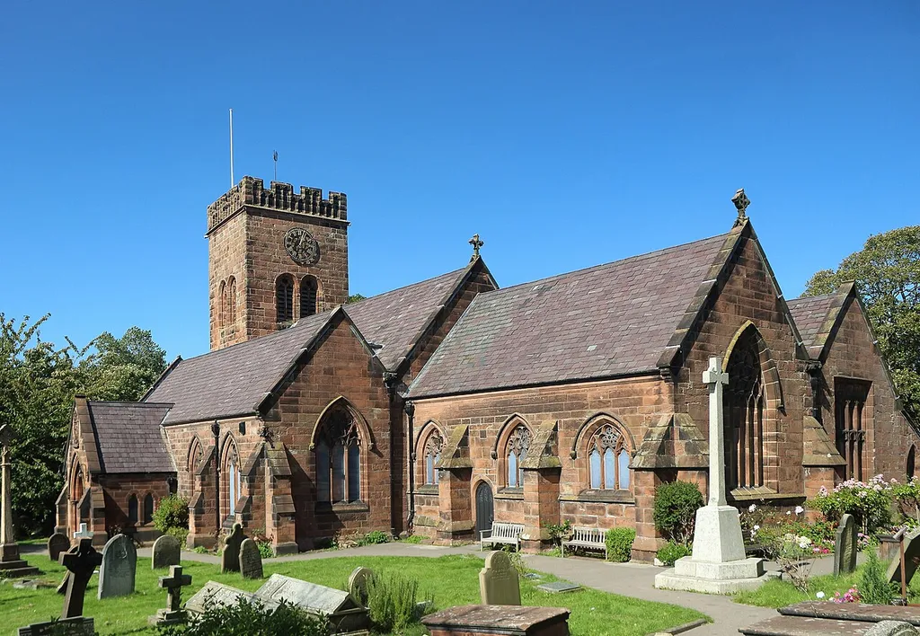 Grade II listed St Bridget's church, West Kirby, from the southeast corner of the churchyard.