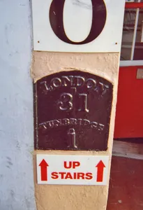 Milestone, Railway Approach, close to N of Pembury Road, in wall of Beat N Track shop