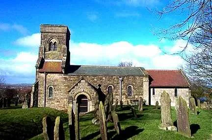 Reighton, St Peter's Church. This Church is in the south west corner of the OS grid which it occupies. It is situated on the eastern side of the A165 road which runs through the village.