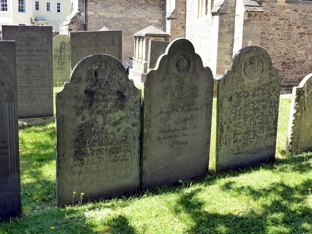 Photograph of three headstones in the churchyard of St Peter's Church, East Bridgford, Nottinghamshire, England
